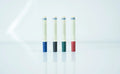 Four whiteboard pens in black, blue, green and red