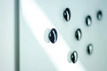 Black disc magnets on glass whiteboard