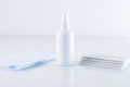 Microfibre cloths and a bottle of cleaner