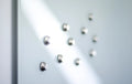 Stainless steel cone magnets on whiteboard